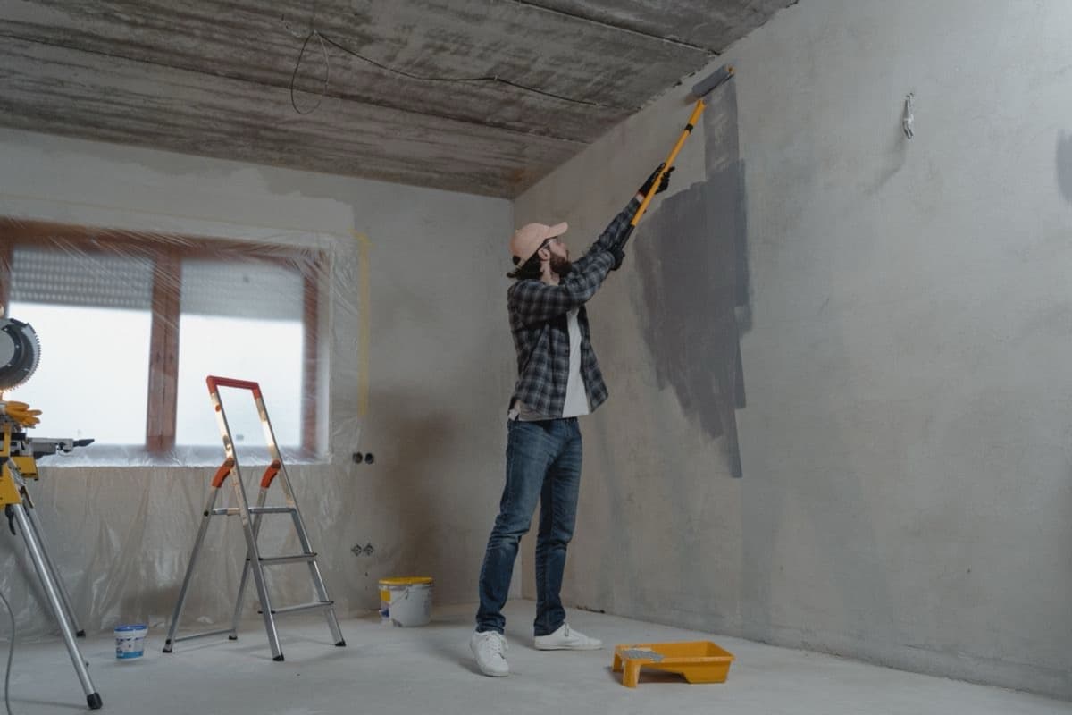 Painter preparing a commercial interior finish